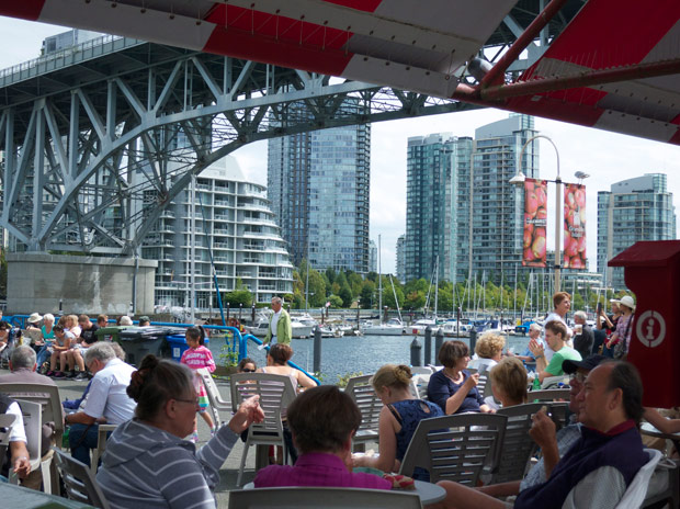 granville-island-people-under-the-granville-street-bridge