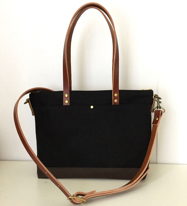 modern-coup-waxed-canvas-leather-bags-custom-satchel-black-brown-straps-nupur-front