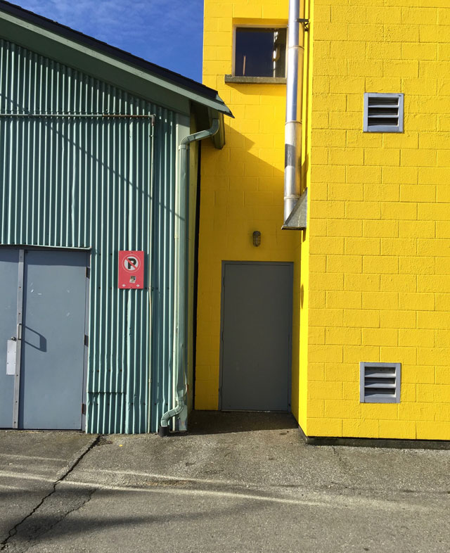 modern-coup-waxed-canvas-leather-bags-granville-island-yellow-building